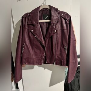 Burgundy leather jacket.